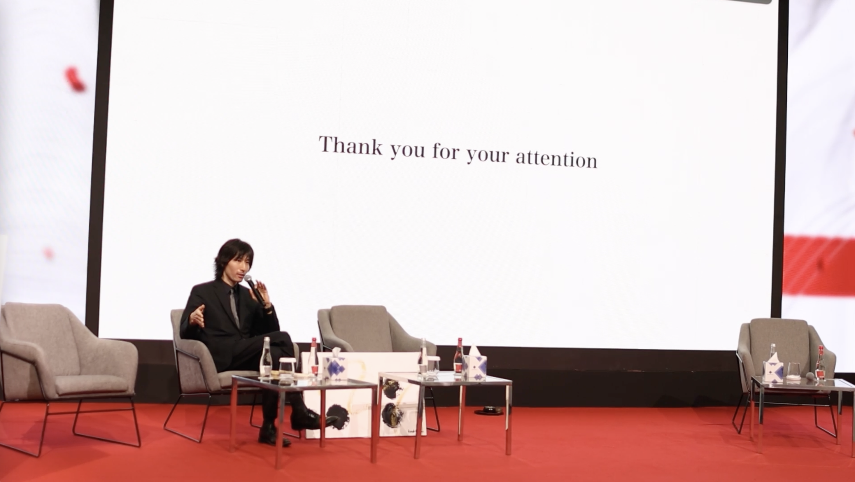 Kazuki Otsuka giving a keynote at Japan Kyoto Trade Exhibition